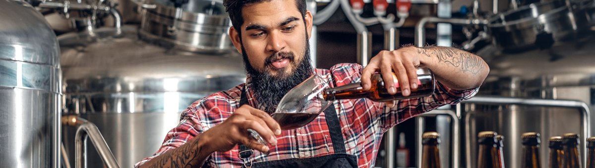 Pouring beer in glass