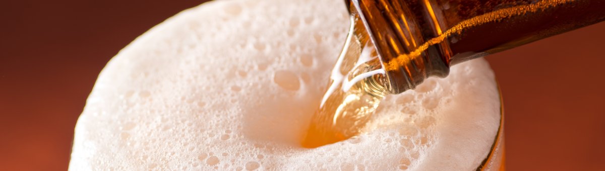 Pouring beer into glass